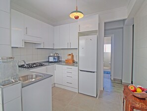 Cabinetry, Property, Building, Drawer, Kitchen, Lighting, Countertop, Orange, Interior Design, Wood