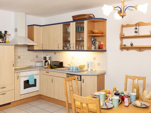 Furniture, Kitchen, Wood, Interior Design, Kitchen Appliance, Countertop, Cabinetry, Lighting, Flooring, Major Appliance
