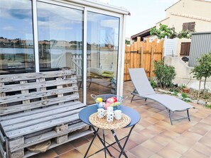Furniture, Property, Table, Plant, Window, Azure, Outdoor Furniture, Chair, Wood, Interior Design