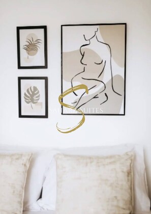 Relax in a cosy, modern space with soft linens, elegant decor, and a peaceful ambiance