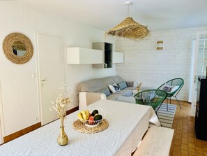 Furniture, Property, Table, Couch, Interior Design, Lighting, Architecture, Floor, Living Room, Decoration