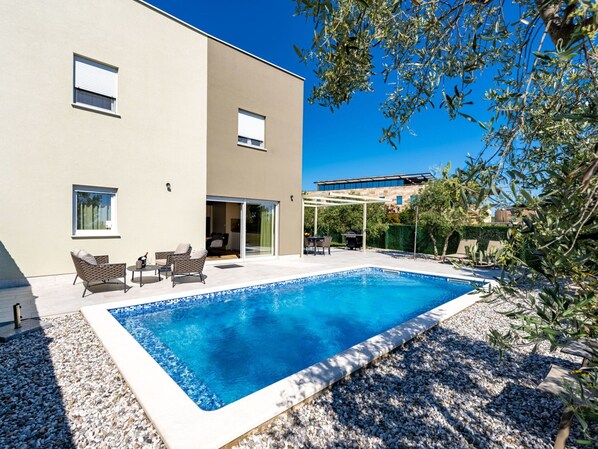 Swimming Pool, Resort, Composite Material, Estate, Outdoor Furniture, Eco Hotel, Villa, Shade, Leisure, Chair