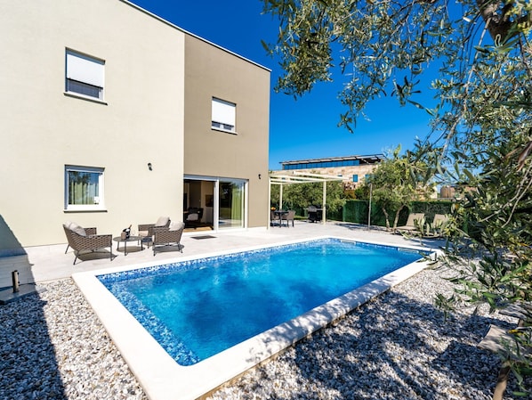 Swimming Pool, Resort, Composite Material, Estate, Outdoor Furniture, Eco Hotel, Villa, Shade, Leisure, Chair