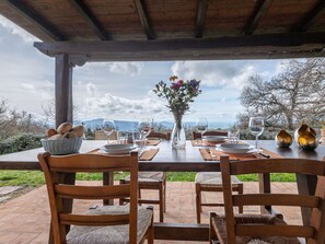 Sky, Table, Furniture, Cloud, Property, Plant, Chair, Flower, Wood, Outdoor Table