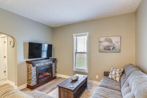 Living Area | Electric Fireplace | Flat-Screen TV | Board Games