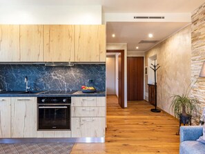 Cabinetry, Property, Countertop, Plant, Building, Wood, Kitchen Stove, Kitchen, Interior Design, Floor