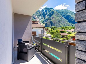 Sky, Building, Shade, Mountain, Cloud, Wood, Urban Design, Residential Area, Real Estate, Condominium