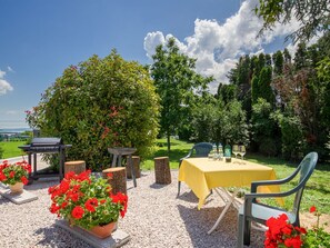 Flower, Plant, Cloud, Sky, Property, Plant Community, Furniture, Table, Chair, Botany