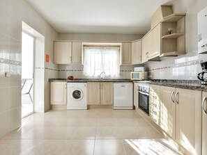 Furniture, Property, Plant, Comfort, Textile, Wood, Interior Design, Cabinetry, Houseplant, Flooring