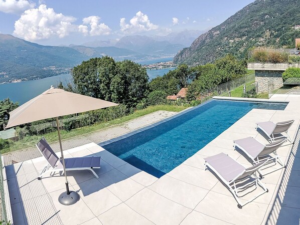Water, Sky, Cloud, Property, Furniture, Swimming Pool, Azure, Plant, Building, Outdoor Furniture