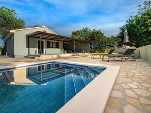 Sky, Cloud, Water, Property, Building, House, Swimming Pool, Shade, Tree, Chair