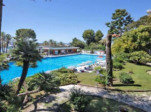 Plant, Sky, Water, Property, Swimming Pool, Tree, Leisure, Real Estate, Arecales, Urban Design