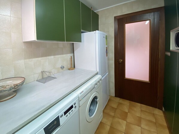 Laundry Room, Property, Cabinetry, Plumbing Fixture, Building, Interior Design, Tap, Bathroom Cabinet, House, Floor