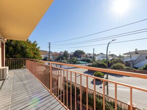 Sky, Building, House, Wood, Urban Design, Street Light, Fence, Line, Tree, Shade