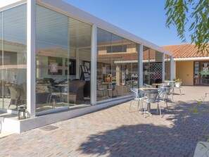 Sky, Furniture, Property, Shade, Chair, Plant, Real Estate, Facade, Table, Door