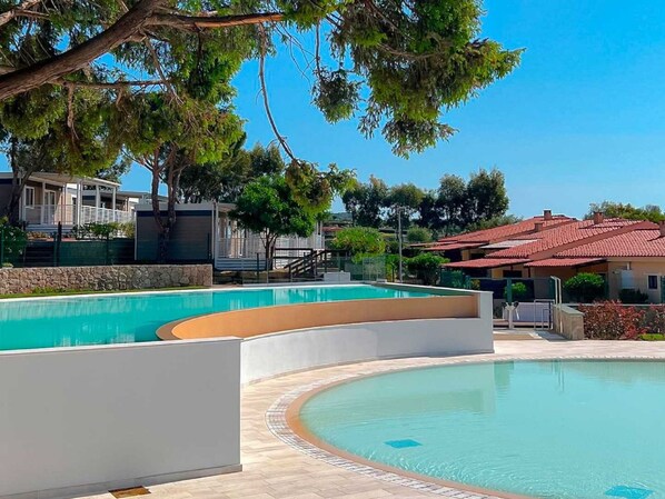 Water, Plant, Sky, Property, Swimming Pool, Azure, Tree, Building, Shade, Leisure