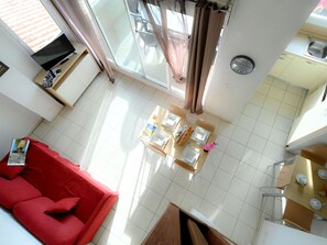 Couch, Building, Wood, Table, Floor, Flooring, Material Property, Studio Couch, Chair, Living Room