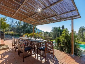 Plant, Property, Furniture, Table, Shade, Outdoor Furniture, Tree, Outdoor Table, Sky, Cottage