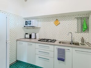 Cabinetry, Property, Countertop, Building, Sink, Interior Design, Kitchen, Floor, Wall, Flooring