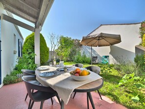 Plant, Property, Table, Furniture, Sky, Chair, Shade, Building, Outdoor Furniture, Outdoor Table