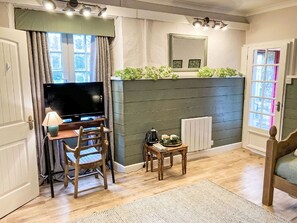 Furniture, Building, Wood, Table, Flooring, Chair, Floor, Cabinetry, Couch, Living Room