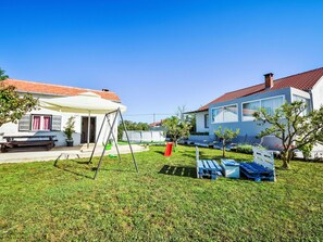 Sky, Plant, Shade, Tree, Land Lot, Building, Grass, House, Leisure, Landscape