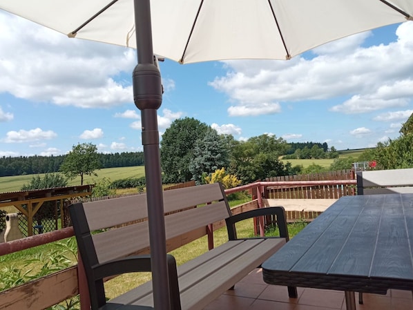 Sky, Property, Plant, Cloud, Shade, Umbrella, Wood, Outdoor Furniture, Tree, Leisure