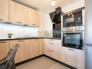 Cabinetry, Property, Countertop, Kitchen Sink, Kitchen Appliance, Kitchen Stove, Home Appliance, Kitchen, Sink, Wood