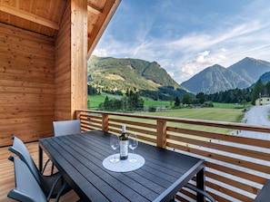 Cloud, Table, Sky, Property, Furniture, Building, Nature, Mountain, Wood, Interior Design