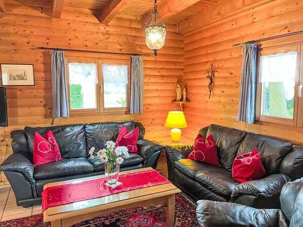 Couch, Furniture, Property, Window, Table, Green, Building, Picture Frame, Plant, Wood