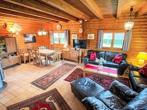 Furniture, Couch, Table, Wood, Interior Design, Lamp, Living Room, Picture Frame, Floor, Flooring