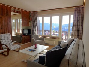Furniture, Table, Comfort, Couch, Curtain, Building, Window, Shade, Wood, Chair