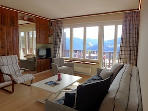 Furniture, Table, Comfort, Couch, Curtain, Building, Window, Shade, Wood, Chair