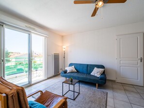 Property, Furniture, Couch, Table, Azure, Window, Wood, Comfort, Ceiling Fan, Interior Design