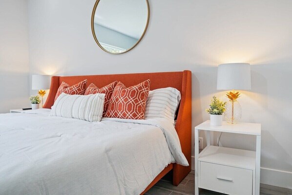 Master bedroom with comfortable king size bed and high quality bed sheets