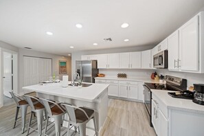 Fully equipped kitchen with coffee bar
