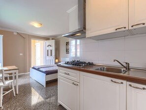 Cabinetry, Countertop, Furniture, Building, Tap, Kitchen, Kitchen Stove, Wood, Kitchen Sink, Drawer