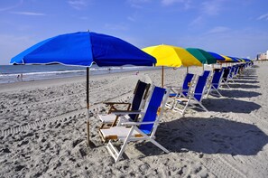 Enjoy beach chair and umbrella rentals (for a fee) provided by the city of Myrtle Beach! * subject to weather and availability