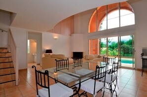 Savour your meals at our spacious dining table, a hub for great food and great conversations.