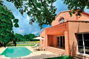 Unwind and soak up the sun on our comfortable transats, the perfect spot for a serene afternoon.
