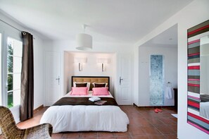 The master suite is a haven of tranquility, featuring a comfortable double bed for a peaceful night's sleep.