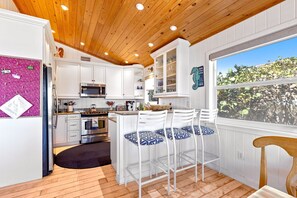 Extra seating for three at the kitchen counter.