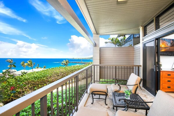 Oceanfront lanai with alfresco dining and unforgettable sunset views. KRV-2912