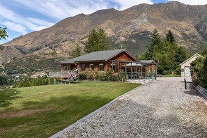 Exterior View: Nestled among stunning mountains, enjoy outdoor serenity in a lush garden!