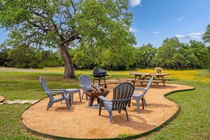 Outdoor area with firepit and Picnic table