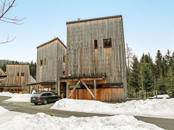 Sky, Building, Property, Snow, Wood, Tree, Vehicle, Plant, Car