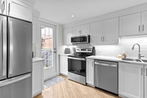 Cook up a storm in this fully equipped kitchen! Featuring stainless steel appliances, sleek finishes, and all the essentials for your culinary creations.