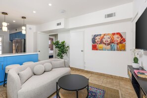 Artful elegance awaits! Enjoy vibrant décor, plush seating, and a chic vibe.