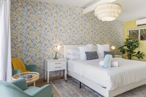 Escape to this tranquil haven, where a cozy king-size bed invites you to relax and unwind. The modern design and elegant touches create a serene atmosphere perfect for a peaceful night's sleep.