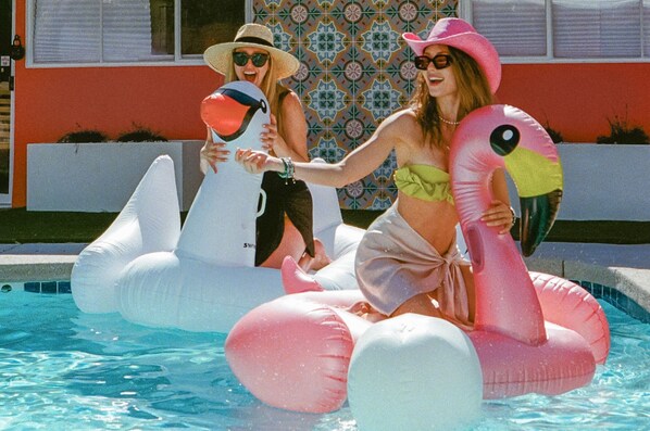 Sunny poolside vibes with , flamingo floats, and relaxing resort-style ambiance – your ultimate escape awaits!